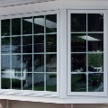 exterior of home with white bay window