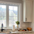 interior of home kitchen with casement windows