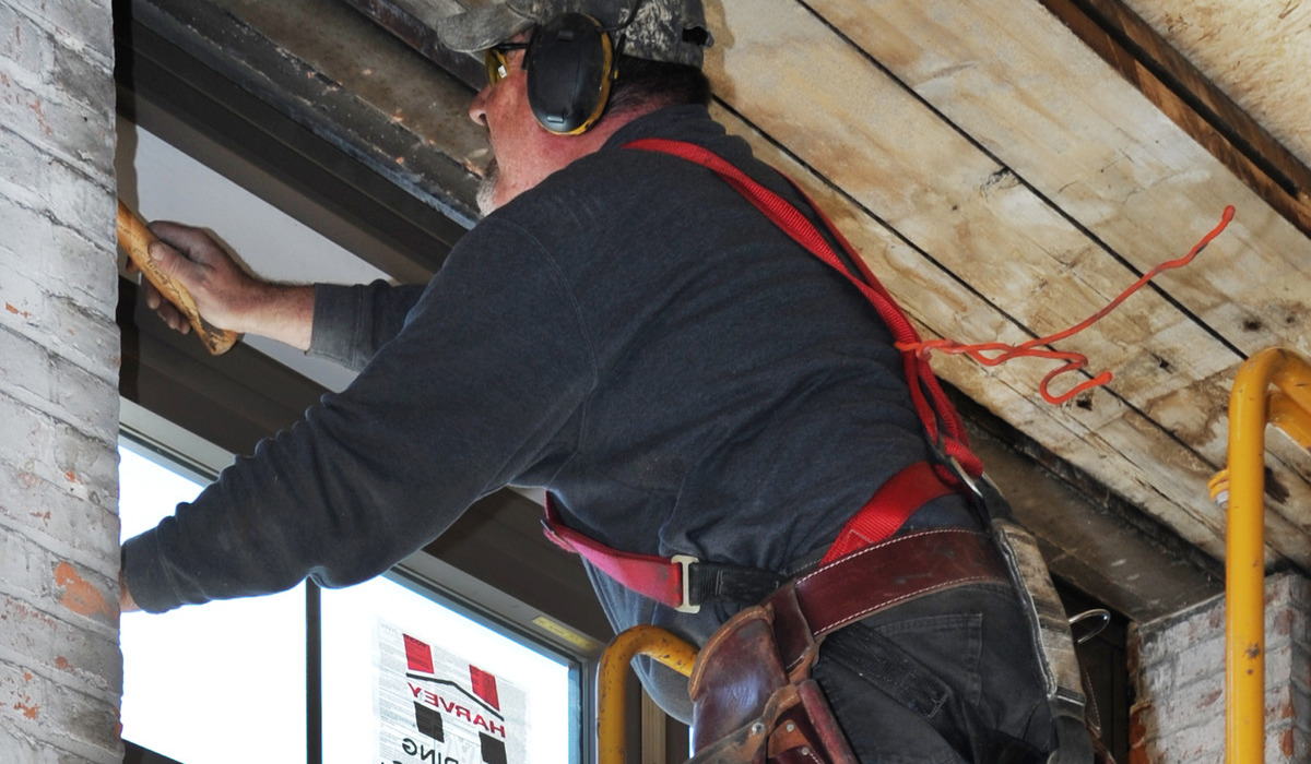 Contractor Installing Harvey Window