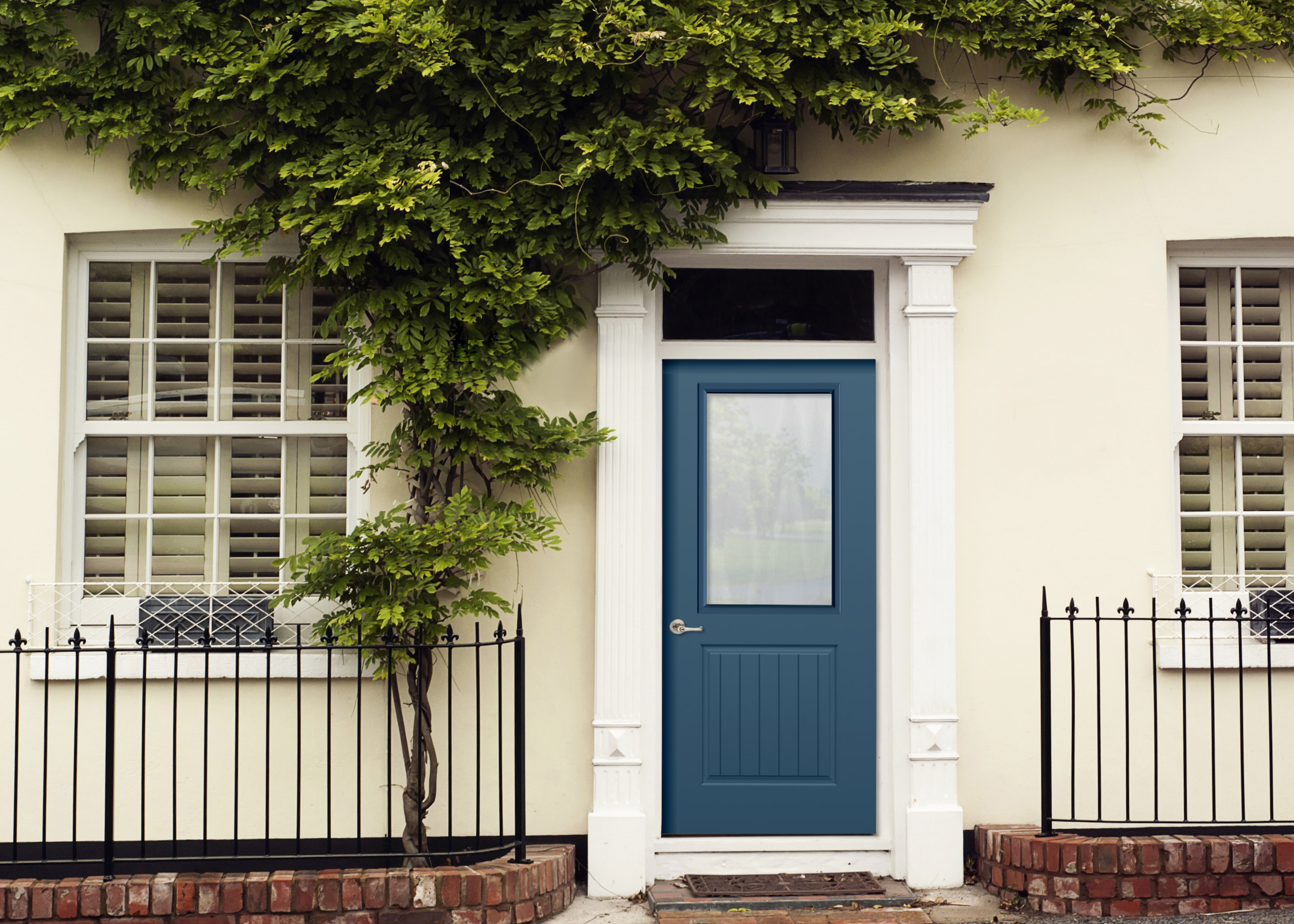 Image of blue cottage door with privacy glass