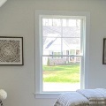 interior of bedroom with single hung window