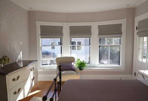 interior of bedroom with double hung windows