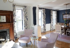 interior of living room with double hung windows