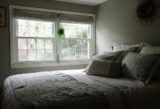 interior of bedroom with double hung windows